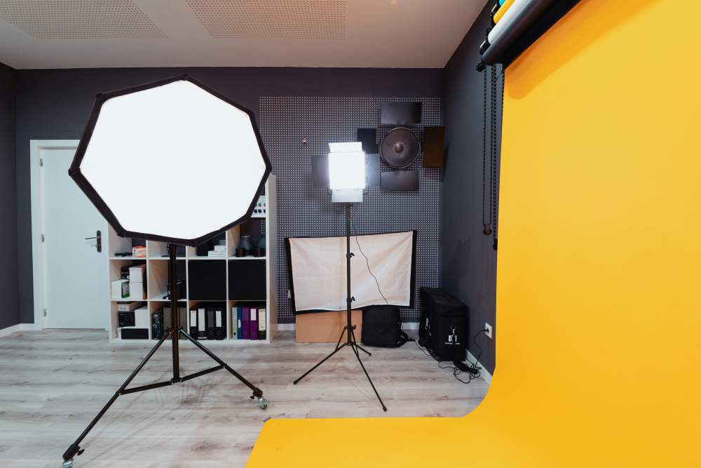 Production studio with lights and backdrop